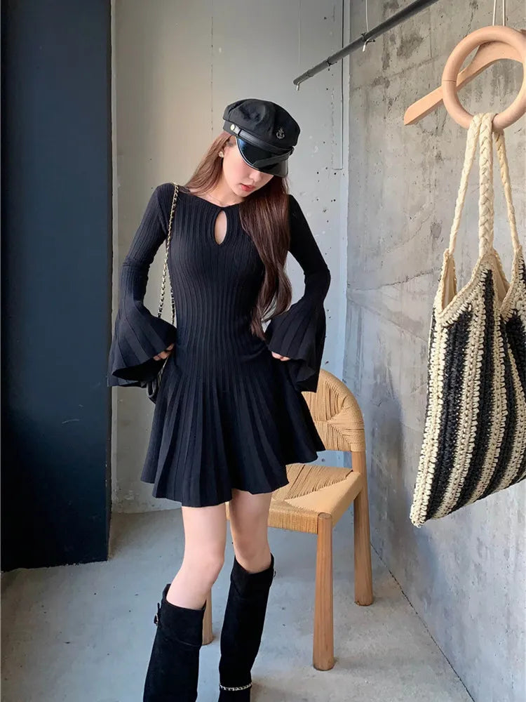 LVSANW Korean style Elegant Knitted Dress Women Flare Sleeve O-neck Hollow Out Autumn Winter Sexy Pleated Mini Dresses