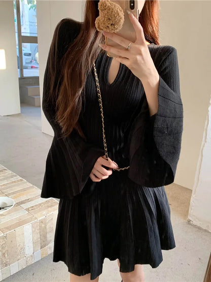 LVSANW Korean style Elegant Knitted Dress Women Flare Sleeve O-neck Hollow Out Autumn Winter Sexy Pleated Mini Dresses