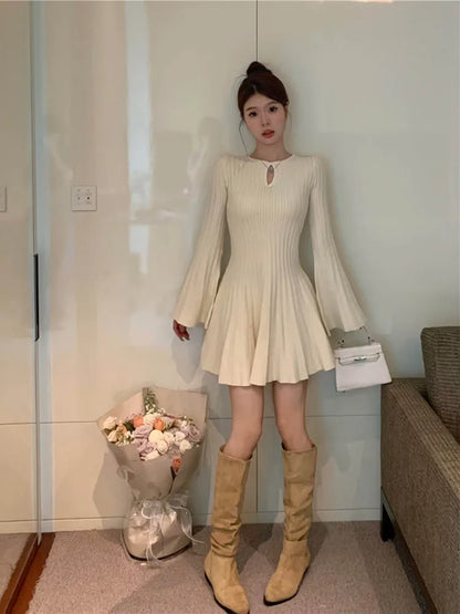 LVSANW Korean style Elegant Knitted Dress Women Flare Sleeve O-neck Hollow Out Autumn Winter Sexy Pleated Mini Dresses