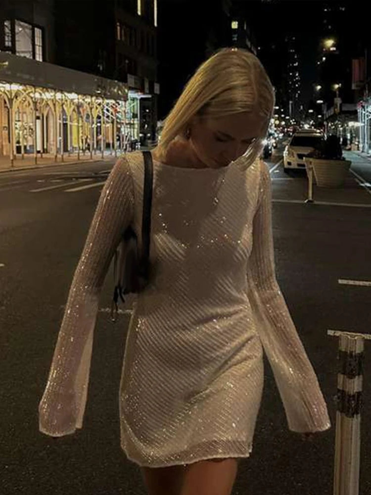 LVSANW White Big Leaky Back Sequin Dress Shiny Women Elegant Long Sleeve Slim Fitting Temperament Evening Gown Backless Short Dress