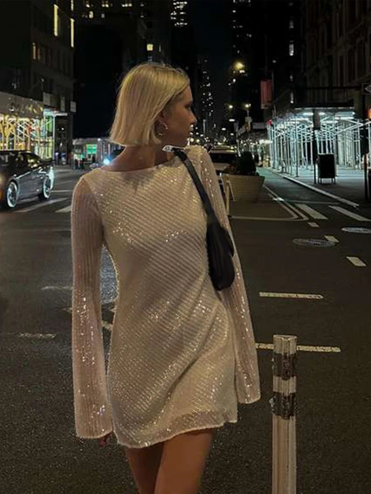 LVSANW White Big Leaky Back Sequin Dress Shiny Women Elegant Long Sleeve Slim Fitting Temperament Evening Gown Backless Short Dress