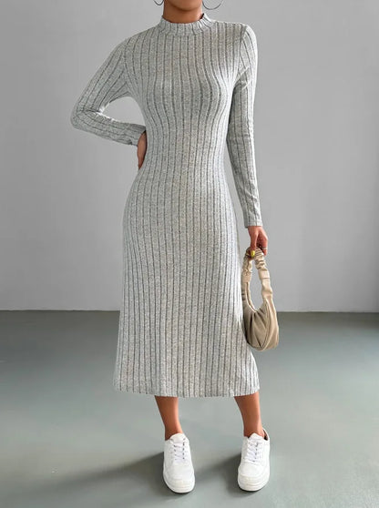 LVSANW Women's 2024 autumn new casual mid length dress, European and American slim fit solid color knitted long sleeved dress